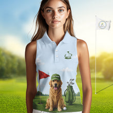 Load image into Gallery viewer, Woman wearing a sleeveless golf shirt with a dog and golf club design on a golf course background