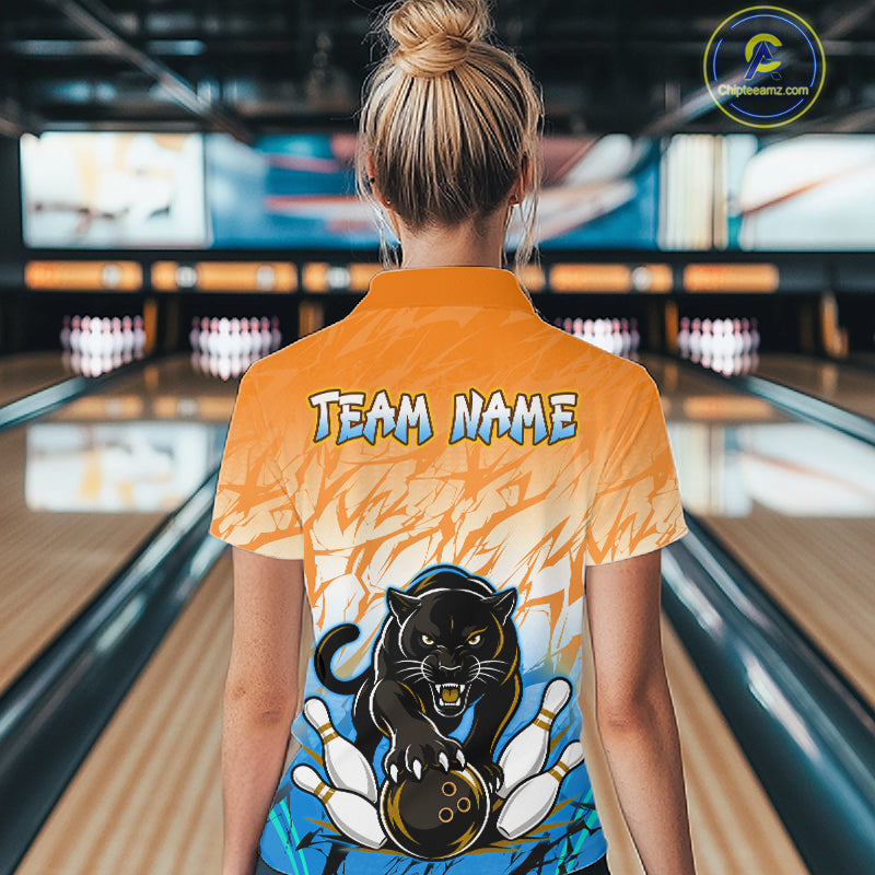 Bowler wearing custom orange and blue leopard bowling shirt on the lanes