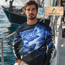 Load image into Gallery viewer, Man wearing a long sleeve fishing shirt with a bass fish design on a boat