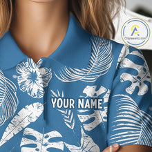 Load image into Gallery viewer, Blue golf polo shirt with white floral patterns and 'YOUR NAME' text,