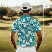Load image into Gallery viewer, Man wearing a teal floral patterned shirt with 'TEAM NAME' on a golf course