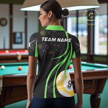 Load image into Gallery viewer, Back view of woman wearing a green 8 ball and 9 ball pool shirt in a billiards hall.