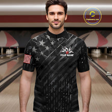 Load image into Gallery viewer, Man wearing a black American flag wings bowling quarter zip jersey during tournament play front view.