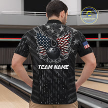Load image into Gallery viewer, Back view of man wearing a black American flag wings bowling polo shirt inside a bowling alley.