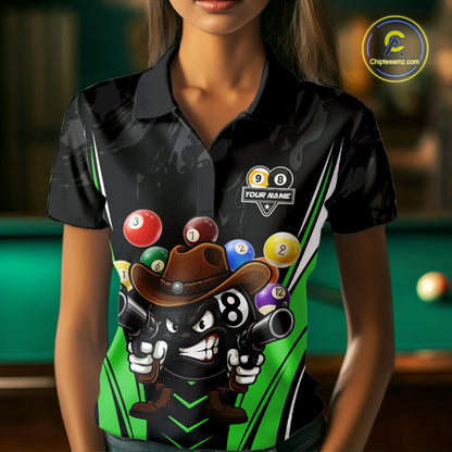 Woman wearing a black and green 8 ball and 9 ball billiard jersey beside a pool table front view.