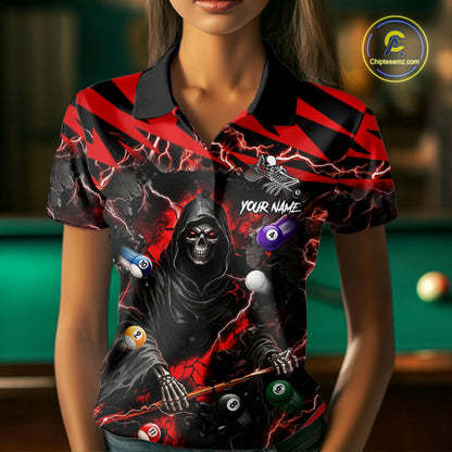 Woman wearing a red grim reaper lightning 8 ball billiard jersey beside a pool table front view.