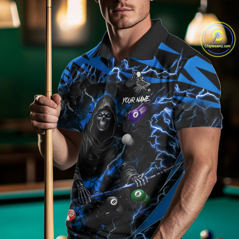 Man wearing a blue grim reaper lightning 8 ball billiard jersey beside a pool table front view.