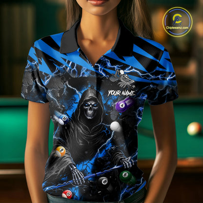 Woman wearing a blue grim reaper lightning 8 ball billiard jersey beside a pool table front view.