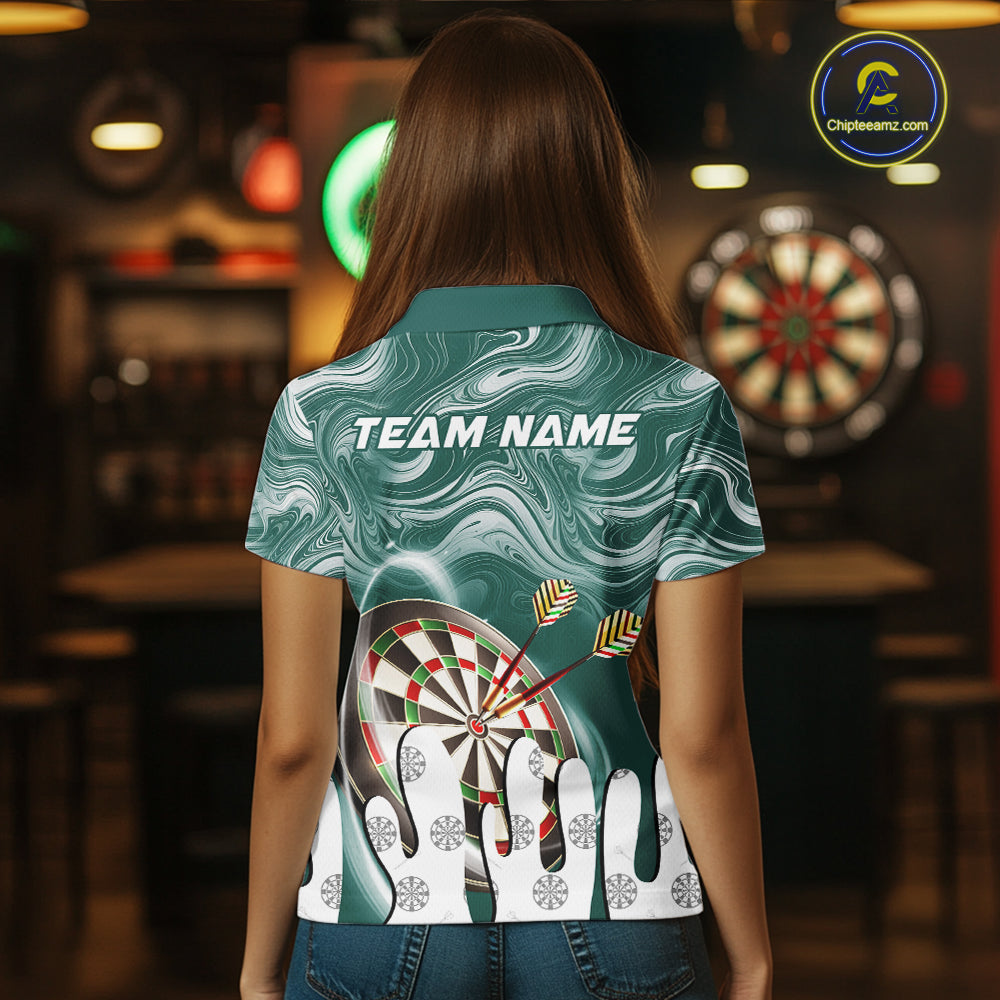 Back view of woman wearing a green marble swirl darts shirt.