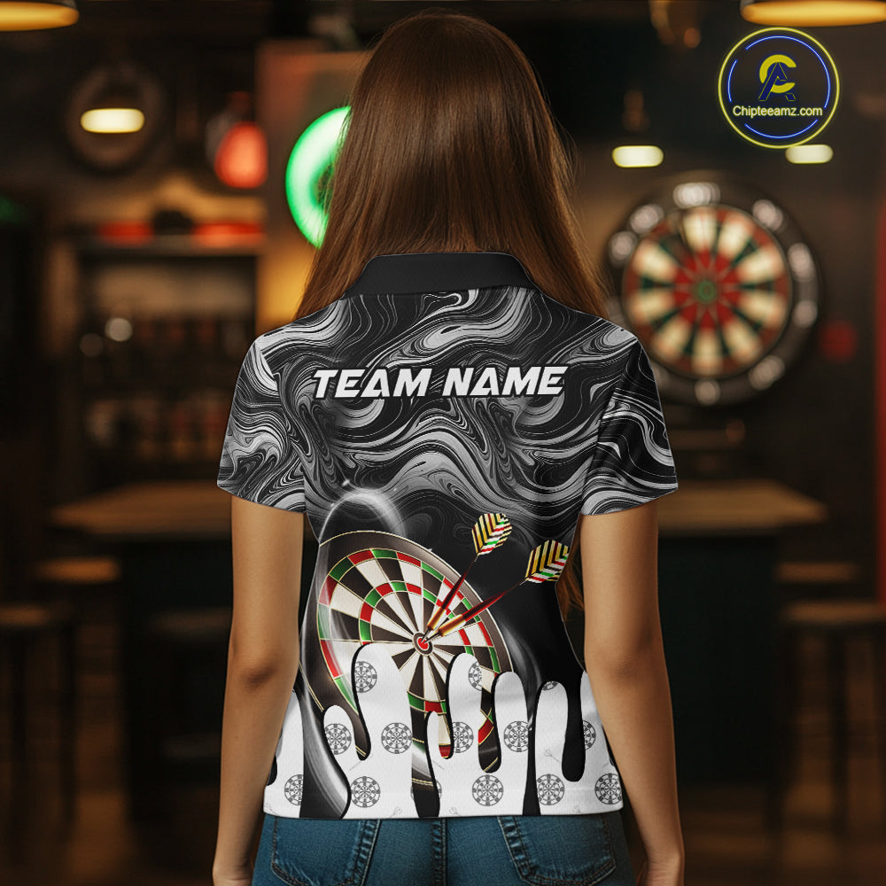 Back view of woman wearing a black marble swirl darts shirt.