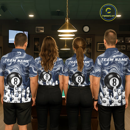Back view of pool players wearing matching blue marble swirl billiard shirts in a game room.
