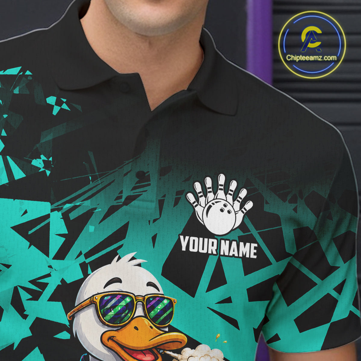Close-up of personalized turquoise funny duck beer bowling team jersey polo shirt featuring collar, buttons and funny duck beer artwork.