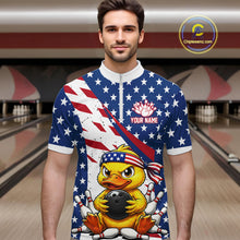 Load image into Gallery viewer, Man wearing a bowling shirt with American flag design and duck holding a bowling ball in a bowling alley.