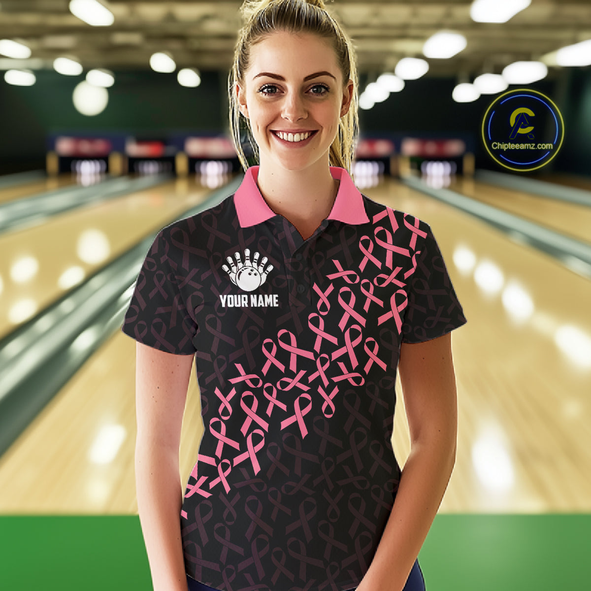 Woman wearing pink ribbon American flag bowling team jersey polo shirt featuring breast cancer awareness artwork, front view.