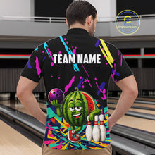 Load image into Gallery viewer, Back view of man wearing a colorful watermelon bowling quarter zip shirt in a bowling alley.