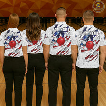 Load image into Gallery viewer, Back view of bowling team wearing matching patriotic eagle bowling shirts in a bowling alley.