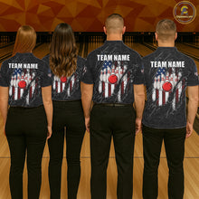 Load image into Gallery viewer, Back view of bowling team wearing matching patriotic bowling shirts in a bowling alley.