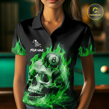 Load image into Gallery viewer, Woman wearing a green flaming skull 8 ball billiard jersey beside a pool table front view.