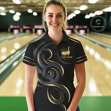 Load image into Gallery viewer, Woman wearing a black and gold crown bowling ball polo shirt at a bowling alley front view.