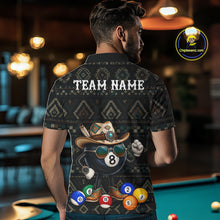 Load image into Gallery viewer, Back view of man wearing an 8 ball tribal pattern pool shirt in a billiards hall.