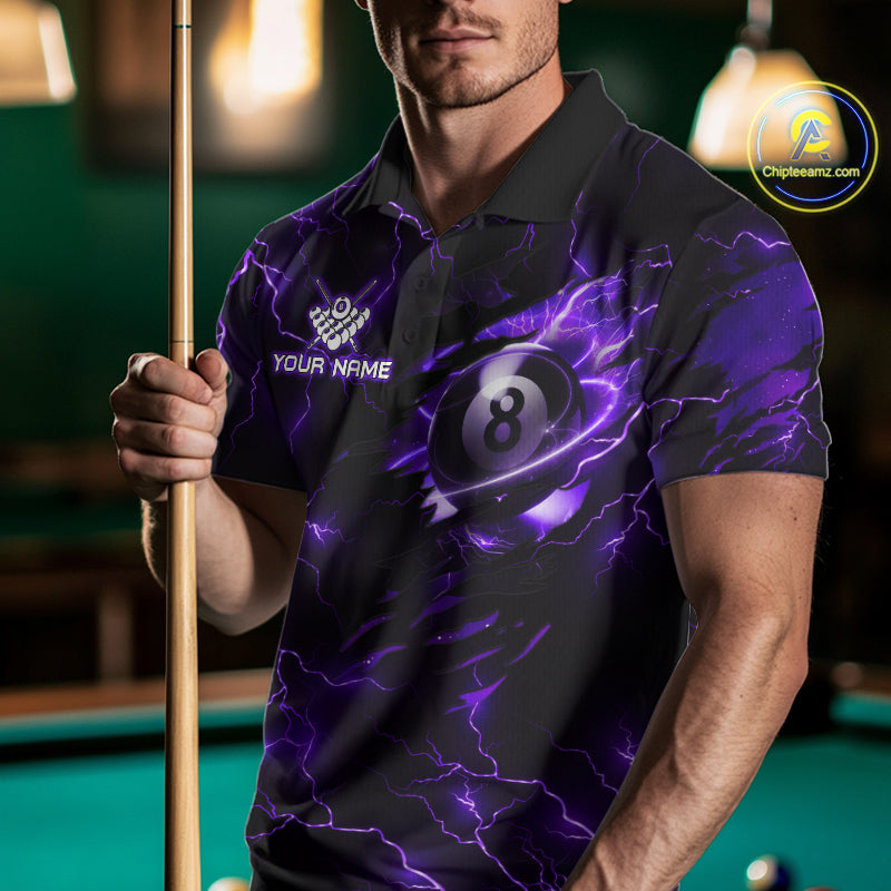 Man wearing a purple thunder lightning billiard jersey beside a pool table front view.