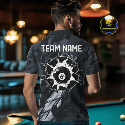 Back view of man wearing a black and grey pool team shirt in a billiards hall.