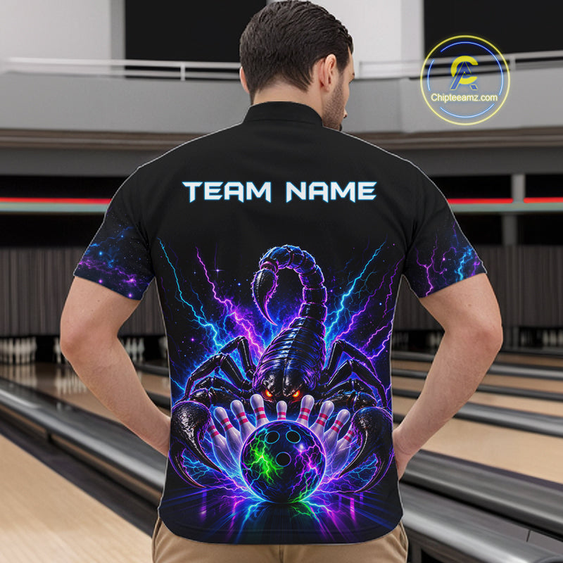 Back view of man wearing a neon scorpion bowling quarter zip shirt in a bowling alley.