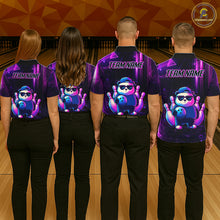Load image into Gallery viewer, Back view of bowling team wearing matching neon panda bowling shirts in a bowling alley.